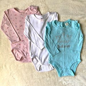 H&M and Oshkosh baby bodysuits
